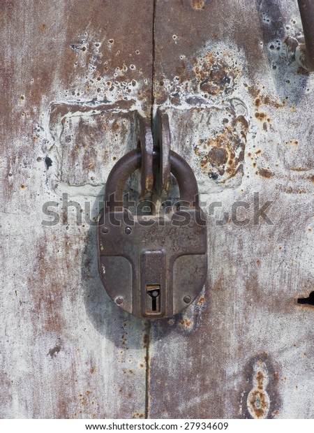 Old Weathered Iron Garage Door Locked Stock Photo Edit Now 27934609