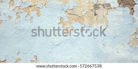 Old Weathered Painted Blue Plastered Peeled Interior Wall Background.  Cracked Flaked Shabby Wall With Rundown Stucco Layer Texture. Abstract Blue White Horizontal Empty Wallpaper. Abstract Web Banner