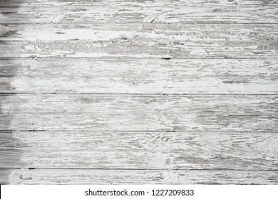 Old weathered painted wood surface. Wooden planks with textured grain and peeling white paint. - Shutterstock ID 1227209833