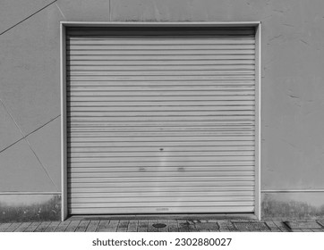 Old weathered and rusty closed steel doors for steel metal store door backgroud and texture.