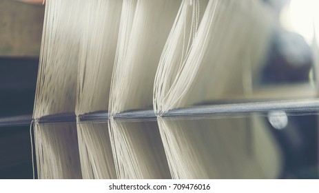 old weaving loom - closeup - photo, vintage filter image