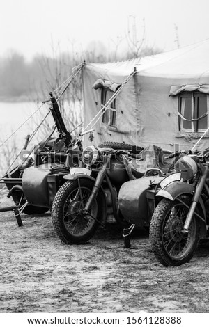 Old Wehrmacht equipment at a military tent. Black and white shot