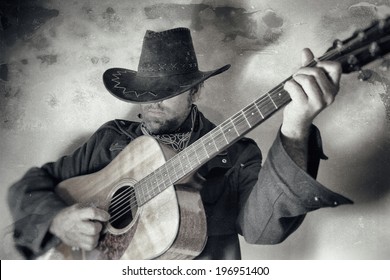 Old West Cowboy With Guitar. A cowboy playing a guitar, edited in vintage film style.