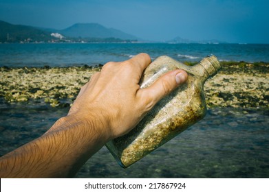 Old Whiskey Bottle With Sand Inside