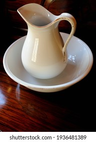 Old White Ceramic Hand Wash Basin And Water Pitcher