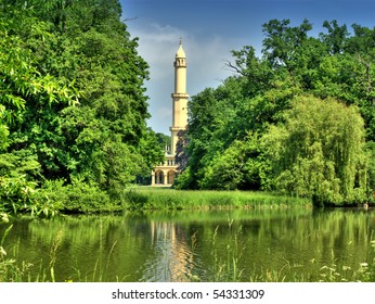 Old white minaret in the park