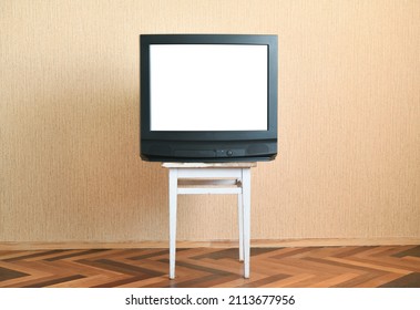 Old White Screen TV On An Old Chair, Old House Design In 1980s And 1990s Style.