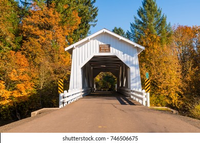 Old White Wooden Covered Bridge and Autumn, Fall Colorful Trees
