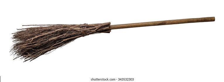 Old wicked witches broomstick isolated on white background.