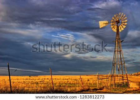 Old Windmill and the Evening Clouds