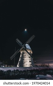 Old windmill at night time