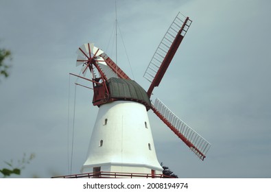 An old windmill on a field in Europe  - Shutterstock ID 2008194974