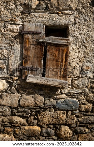 Old window door in Sallent de Gállego village,Pyrenees,Tena valley,Huesca,Spain