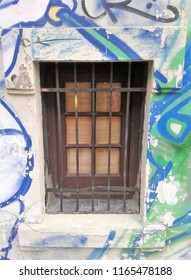 Old window with graffiti