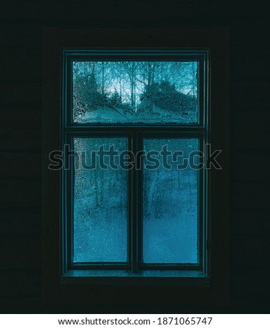 Old window with mystical light	
