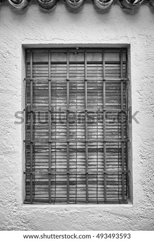 Similar – Two windows with closed shutters