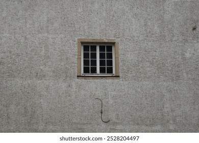 old window on a wall.