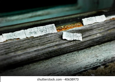 Old Window With Peeled Putty