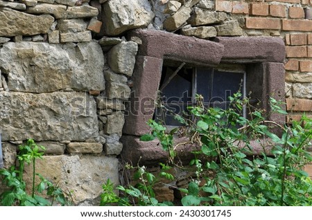 Old window with stone frame.