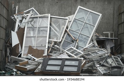 A lot of old windows in a landfill. A lot of trash at at landfill. - Shutterstock ID 1934688194