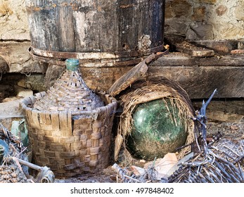 Old Wine Making Kit, Carboys, Demijohns. Abandoned In Cellar. Rural Life, Heritage Now Abandoned.