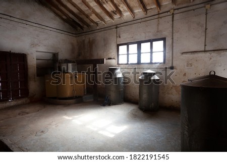 Old winery in Spain, Alicante. The rays of the sun come through the window