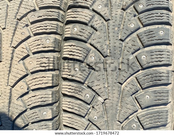 old winter car stud tires\
close up