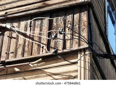 Old Wiring Wires In Front Of Old Wood Wall Background