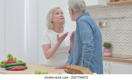 Old Woman Arguing With Old Man In Kitchen 