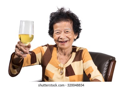 Old Woman Asian With Beer Or Wine, She Drink Like This Every Day. (90 Years Old)