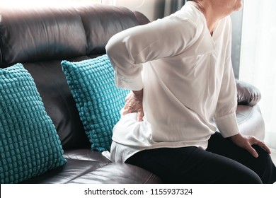 Old Woman Back Pain At Home, Health Problem Concept