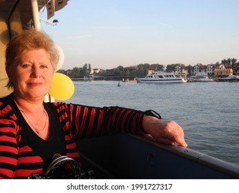 Old Woman With Blond Hair Posing During A Cruise On The Don River