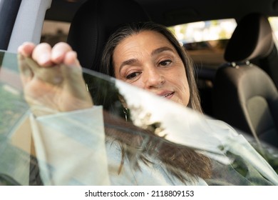 Old Woman In The Car Window