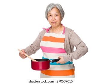 Old Woman Cooking Food