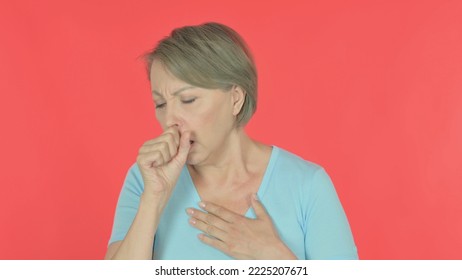 Old Woman Coughing On Red Background