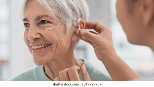 Old woman, doctor hands and patient with hearing aid, help and support with healthcare in clinic. Person with disability, deaf and people, trust and communication, health insurance and medical - Powered by Shutterstock