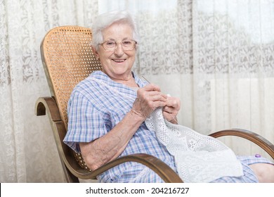 Old Woman Doing Crocheting At Home, Close Up