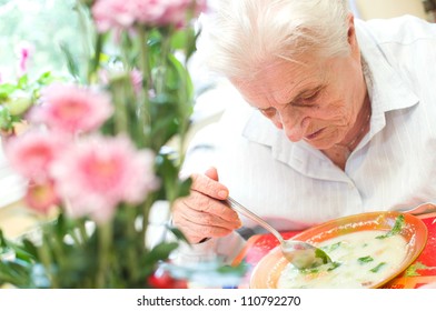 Old Woman Eating Soup