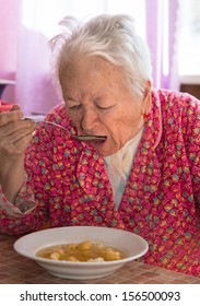 Old Woman Eating Soup