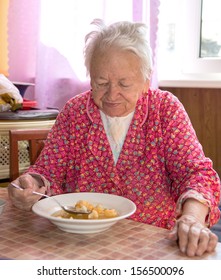 Old Woman Eating Soup