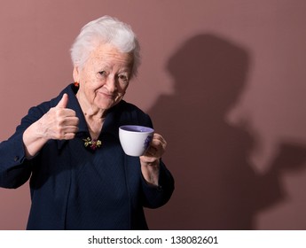 Old Lady Drinking Coffee