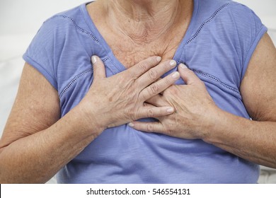 Old Woman Experiencing Chest Pains, Having A Heart Attack Or Stomach Acid