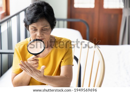 old woman fortune teller doing fortune telling