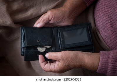 Old Woman Hands Holding Black Opened Empty Wallet Poverty Concept.