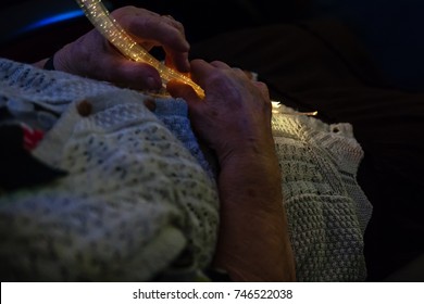 Old Woman Is Having Color Therapy In The Retirement Care Home. Multi Sensory Room