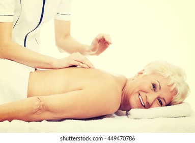 Old Woman Is Having A Massage.