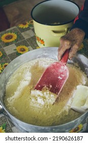 Old Woman Making Dough For Patties, Flour On Table