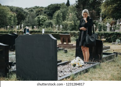Old woman mourning her husband