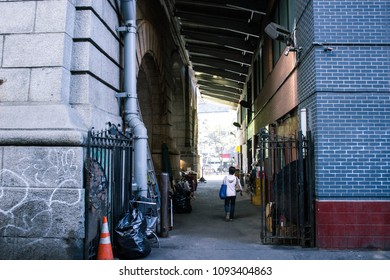 Old Woman In New York Alley