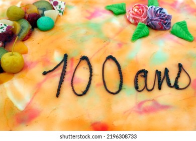 Old Woman On Her One Hundred Birthday. Happy 100 Years Birthday Cake.  France. 